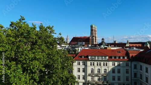 Reveal footage of a the old town of Munich with Frauenkirche photo