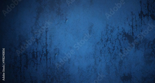A backdrop of dark blue watercolor paint, providing a textured grunge effect that can serve as a dramatic background or banner.