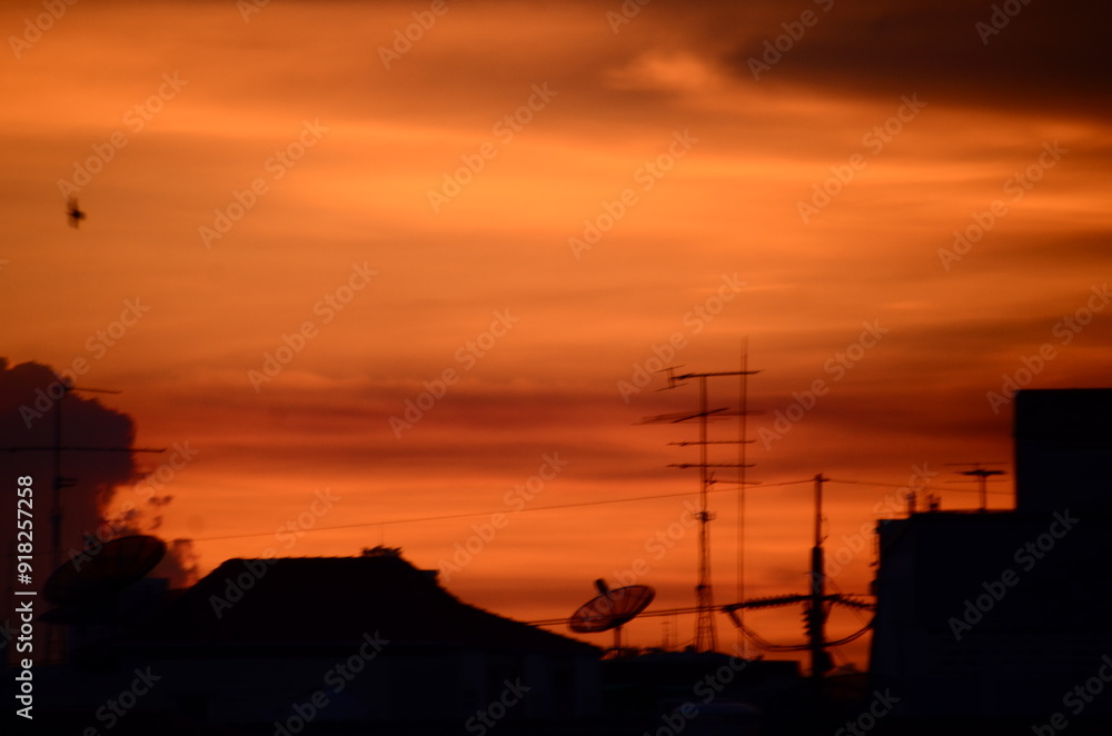 Scenic view dramatic beautiful sunset sky. Natural Sunset Sunrise on meadow silhouette shadow dark land. Vibrant dramatic sky on sunset, dawn, sunrise in Countryside. Landscape Colorful Sky At Sunset Scenic view dramatic beautiful sunset sky. Natural Sunset Sunrise on meadow silhouette shadow dark land. Vibrant dramatic sky on sunset, dawn, sunrise in Countryside. Landscape Colorful Sky At Sunset