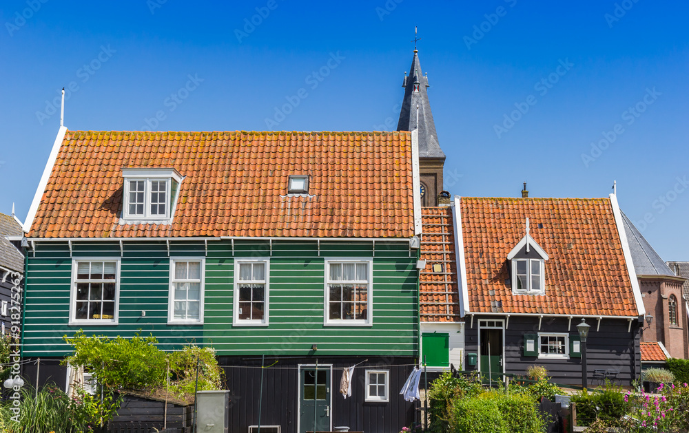 Typical green house in historic village Marken, Netherlands