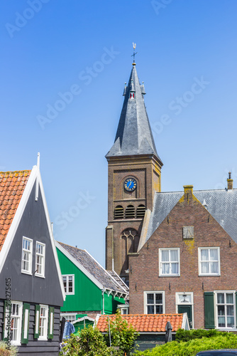 Obraz na płótnie Tower of the great church in historic village Marken, Netherlands w salonie