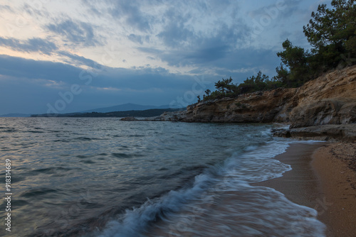 Salonikios beach at sunset on the island of Thassos in Greece. photo