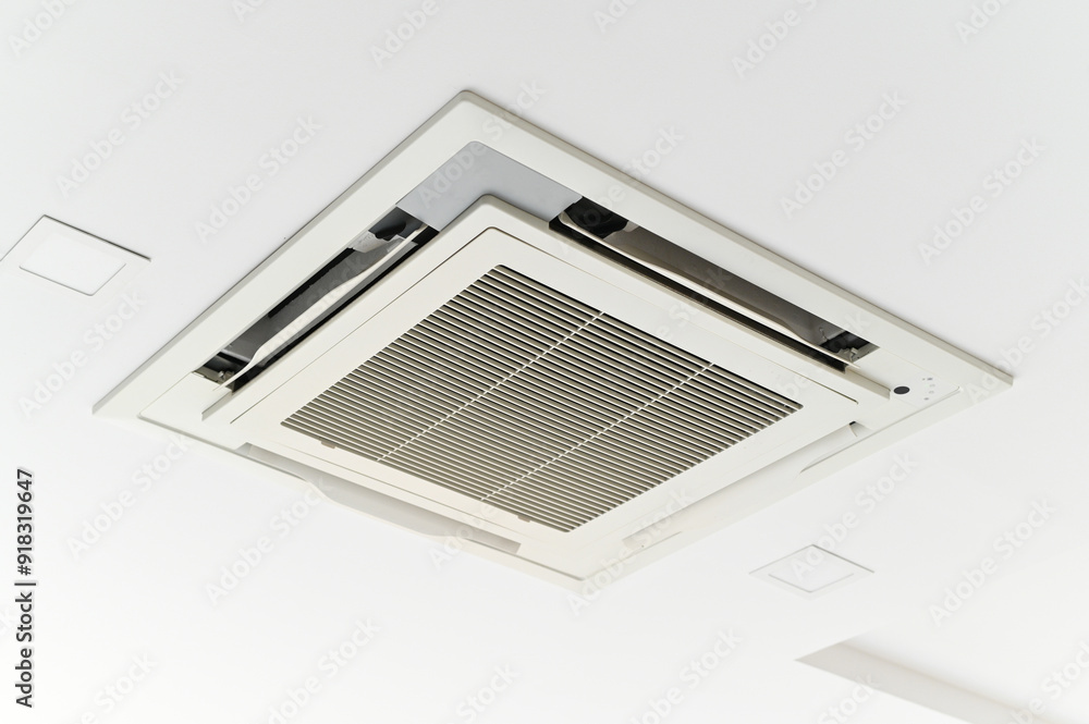 Ceiling-mounted air conditioning unit with modern design and sleek appearance.