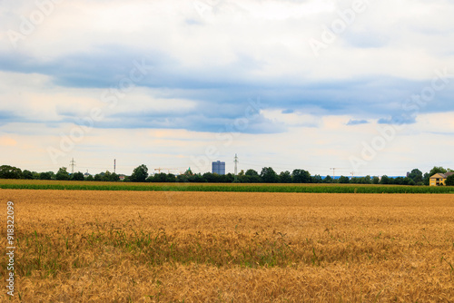 View over the fields near Augsburg on a cloudy day Towards the industrial monument Gaskessel photo