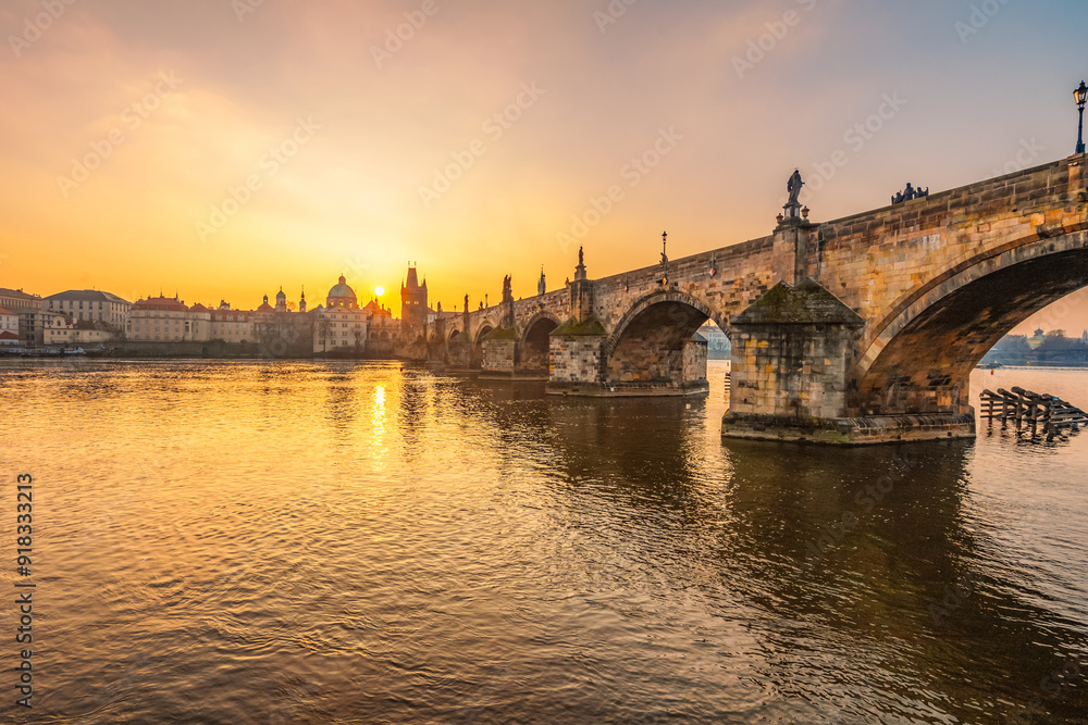 Fototapeta premium View of the city of Prague and the Vltava river with Old Town Bridge Tower on Charles bridge in Prague, Czech Republic.