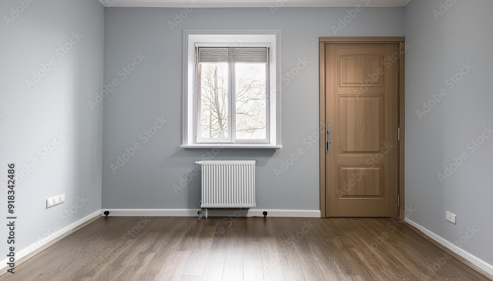 Empty room with door and radiator Empty room with door and radiator