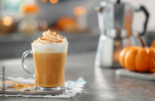 Creamy Pumpkin Spice Latte in a Cozy Setting With Seasonal Decorations
