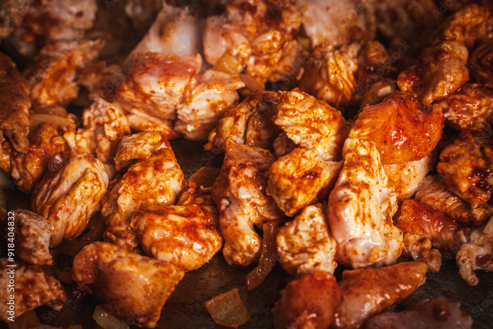 Cut the turkey meat into pieces and fry in a pan with red pepper and tomato sauce Cut the turkey meat into pieces and fry in a pan with red pepper and tomato sauce