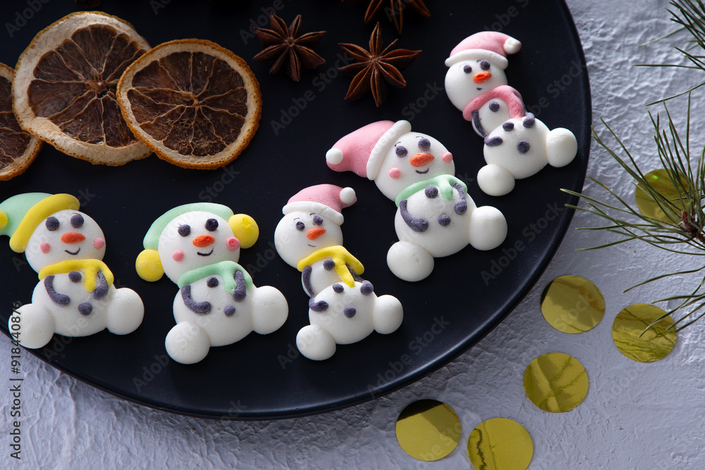 Christmas marshmallows. Winter candy. Sweet food in december. Snowman and Santa Claus Christmas marshmallows. Winter candy. Sweet food in december. Snowman and Santa Claus