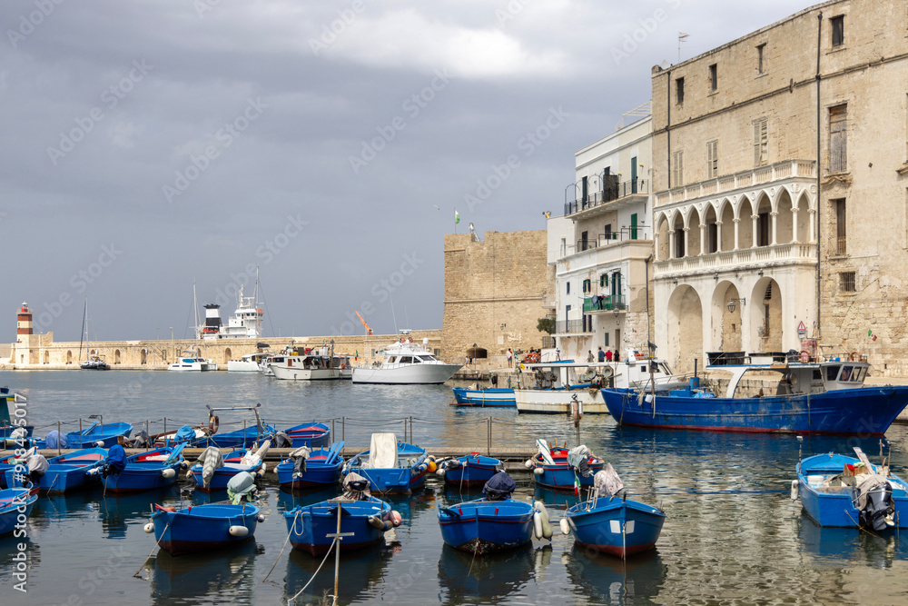 Ancient port (Porto antico) with moored blue boats, Monopoli, Italy, Apulia