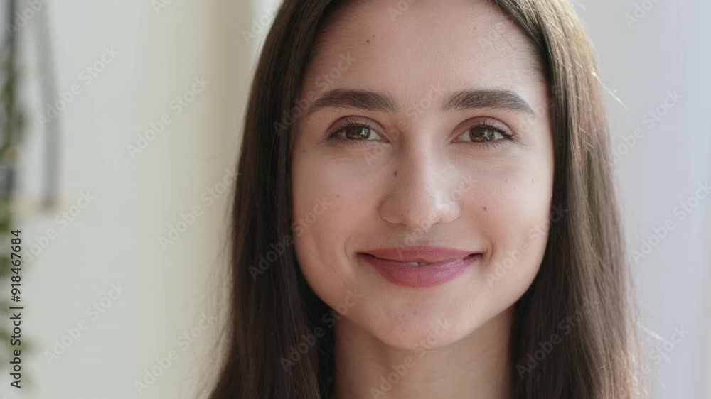 Pretty confident girl smiling at camera, feeling calm Pretty confident girl smiling at camera, feeling calm