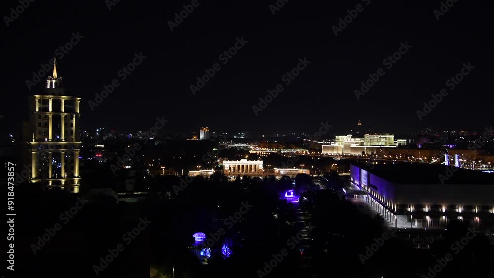 High angle panoramic cityscape of downtown district with residential, office and hotel buildings at night in Moscow, Russia. Some street light illumination. Real time video. City life theme. High angle panoramic cityscape of downtown district with residential, office and hotel buildings at night in Moscow, Russia. Some street light illumination. Real time video. City life theme.