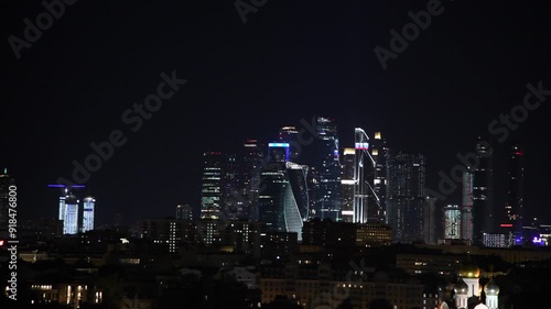 Wallpaper Mural High angle side view of Moscow city downtown district with residential, office and hotel buildings at night in Moscow, Russia. Some street light illumination. Real time video. City life theme. Torontodigital.ca