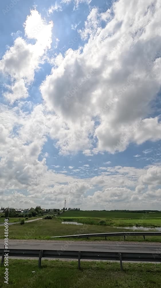 View from the car window to the side of the road, green trees and roadside View from the car window to the side of the road, green trees and roadside