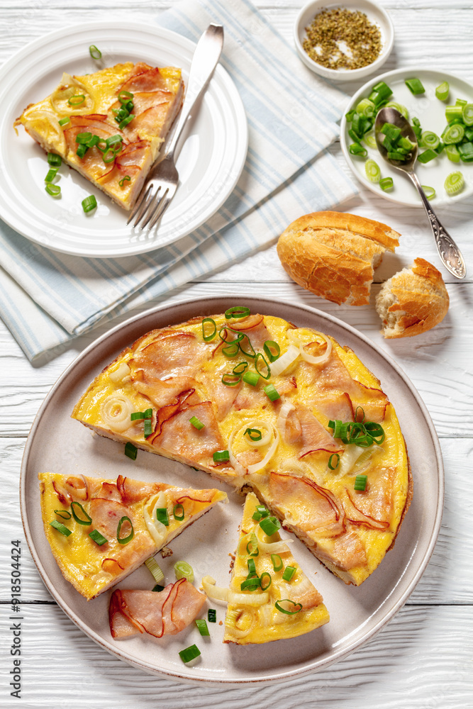 deli ham onion omelette on skillet, top view deli ham onion omelette on skillet, top view