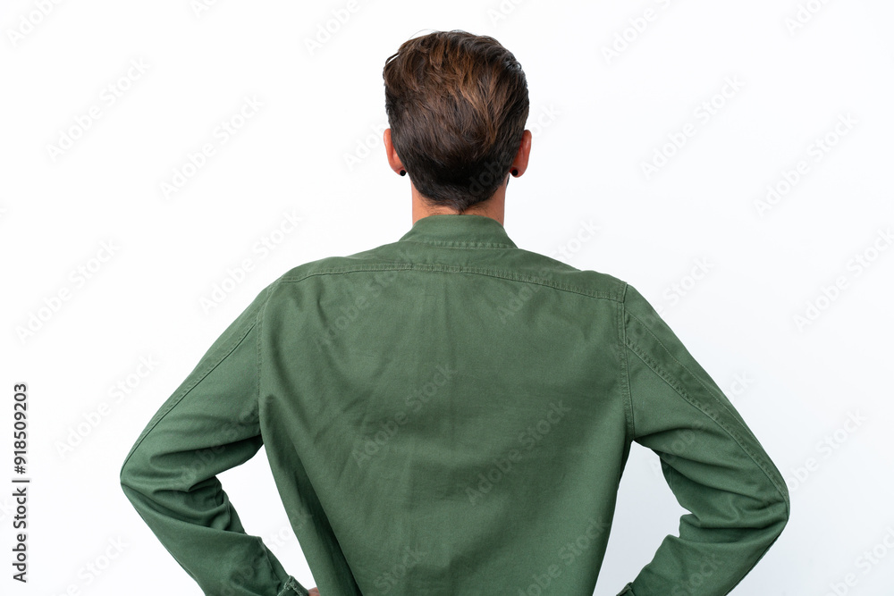 Young caucasian man isolated on white background in back position Young caucasian man isolated on white background in back position