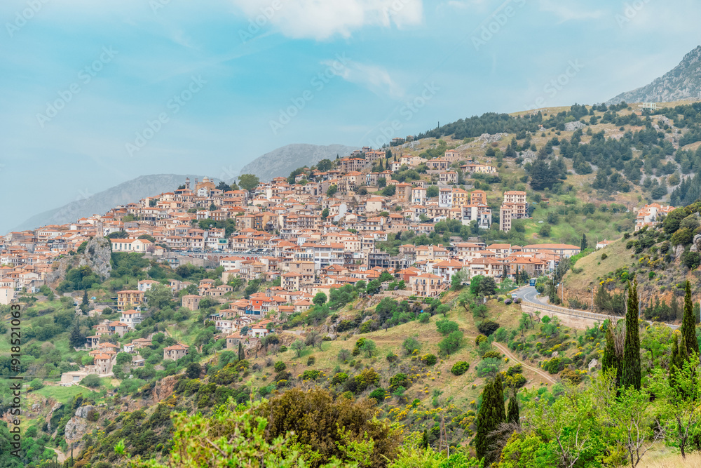 View of the town Arachova, Greece, near Parnassus mountain and Temple of Delphi. View of the town Arachova, Greece, near Parnassus mountain and Temple of Delphi.