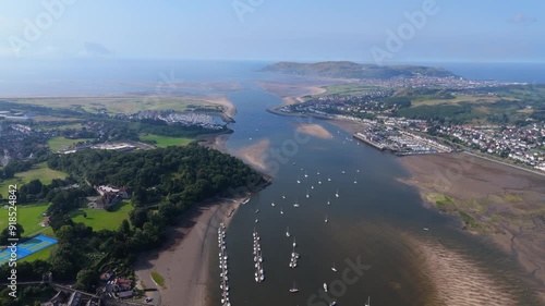 Coastal towns and forest around The Conwy River and estuary in North Wales. Great Orme in background photo