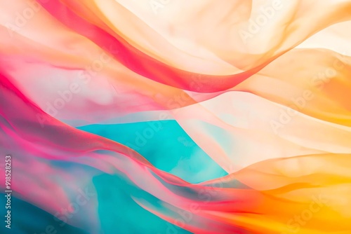 A vibrant abstract image showcasing flowing fabric in warm hues and cool tones, perfect for creative projects and backgrounds.