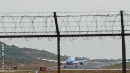 Wallpaper Mural Rear view of a jet plane taking off and gaining altitude. Airliner flying away Torontodigital.ca