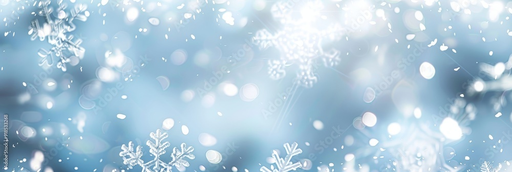 A serene winter scene with delicate snowflakes falling against a soft blue backdrop. Bokeh lights create a warm and festive atmosphere, symbolizing peace, joy, and the magic of the season. A serene winter scene with delicate snowflakes falling against a soft blue backdrop. Bokeh lights create a warm and festive atmosphere, symbolizing peace, joy, and the magic of the season.