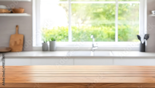 Empty wooden tabletop with blurred modern kitchen background