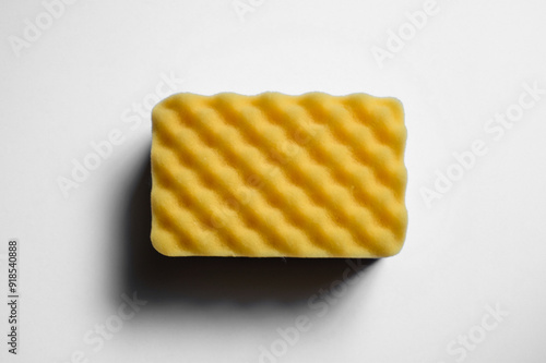 Yellow sponge for washing away dirt