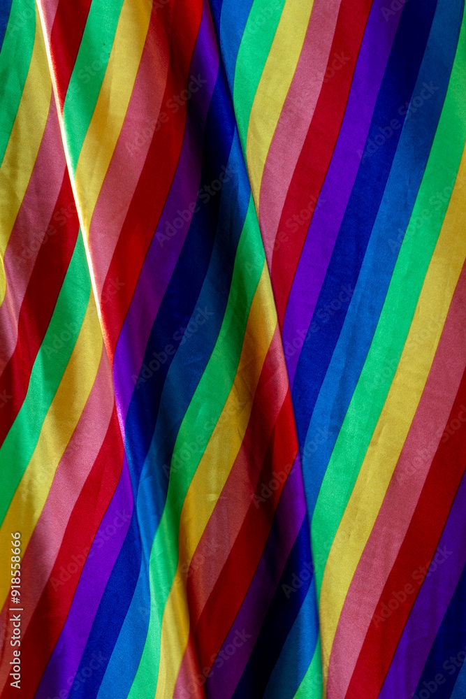 Abstract geometric pattern created with handmade fabric in the colors of the LGBT rainbow flag: Abstract geometric pattern created with handmade fabric in the colors of the LGBT rainbow flag: