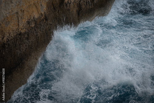 Waves crushing on a rock