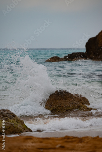 waves crashing on rocks