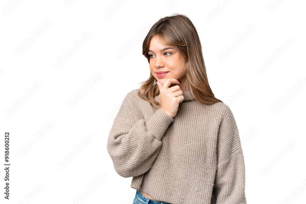 Young girl over isolated chroma key background looking to the side and smiling Young girl over isolated chroma key background looking to the side and smiling