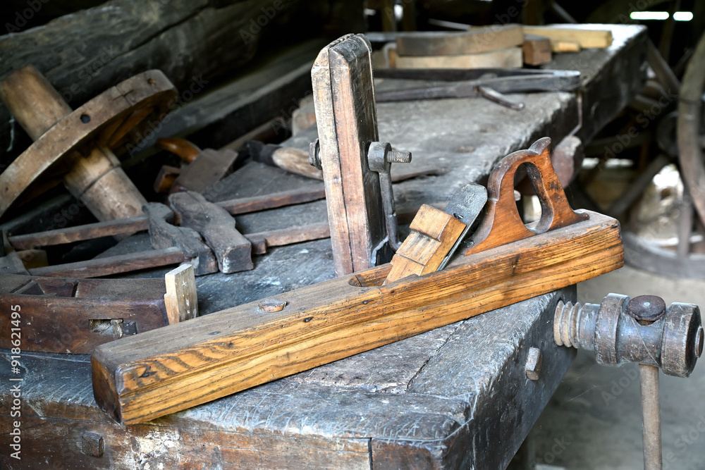 old wood planer long on the carpenter's table old wood planer long on the carpenter's table