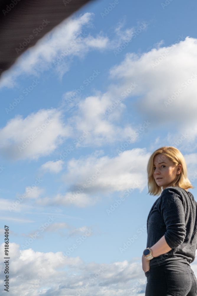 portrait of blonde woman at the pier in Rovaniemi Finland enjoying the nature portrait of blonde woman at the pier in Rovaniemi Finland enjoying the nature