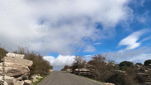 Road to Antequerra National Park, limestone rock formations and known for unusual karst landforms in Andalusia, Malaga, Spain. photo