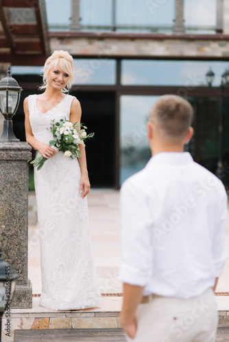 Romantic Outdoor Couple's Wedding Moment Featuring Bride and Groom at Beautiful Venue photo