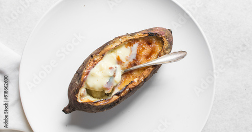 Fotografie Overhead view of sweet potato crème brûlée on a white plate, top view of a sweet
