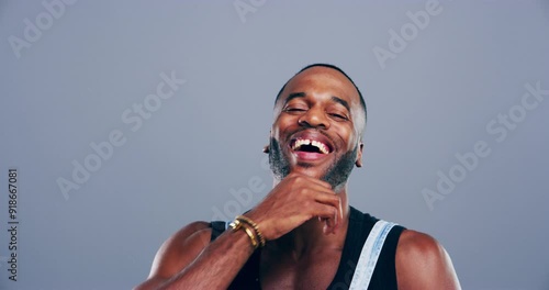 Face, happy and black man laughing in studio for humor, joke and good mood on grey background. Portrait, guy and smile with cheerful personality for comedy, expression or funny reaction to silly news