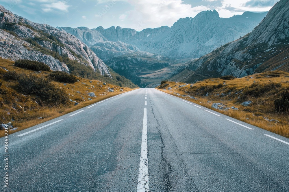Fototapeta premium Empty road with mountains in the background