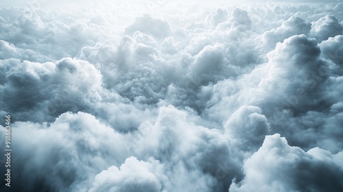 Cumulus clouds, aerial background. Aerial shot with top view of white fluffy clouds gathering.