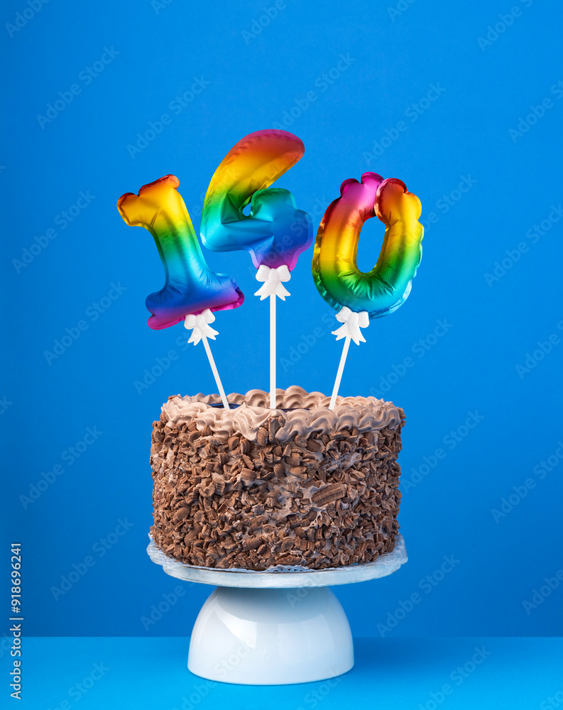 Air balloon number 140 - Birthday cake on blue background Air balloon number 140 - Birthday cake on blue background