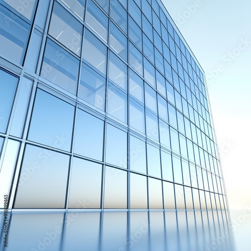 A modern glass building reflecting the sky, showcasing sleek architecture and clear design elements. Perfect for commercial use.