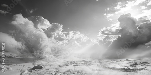 Fototapeta Naklejka Na Ścianę i Meble -  A cloudy black and white sky with fluffy clouds, suitable for use in weather or atmospheric themed designs