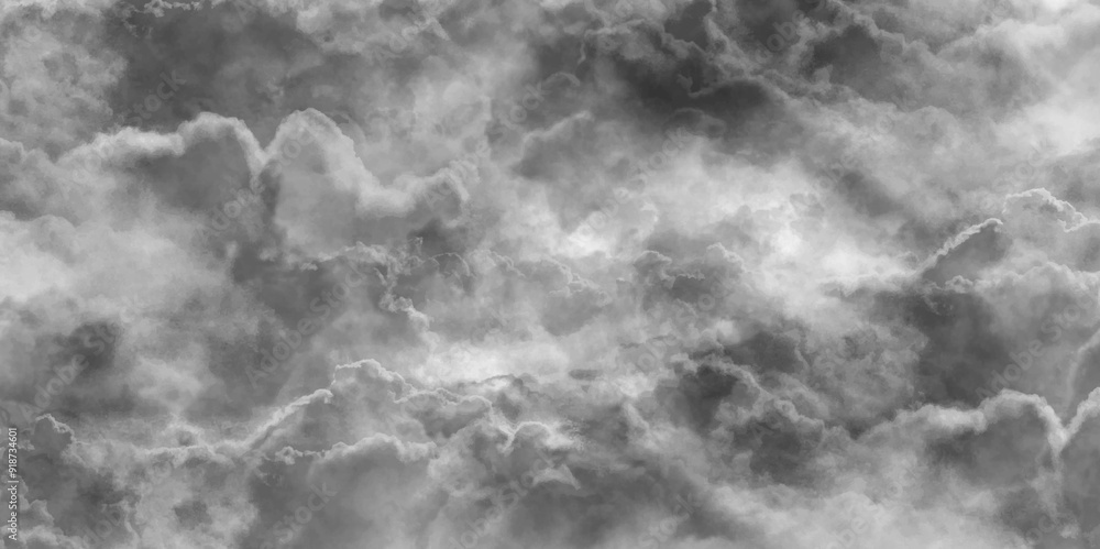 Abstract texture background of dark sky with storm clouds, grey clouds sky on night background dramatic view of the dark clouds and gloomy sky in black, white and grey abstract texture background.