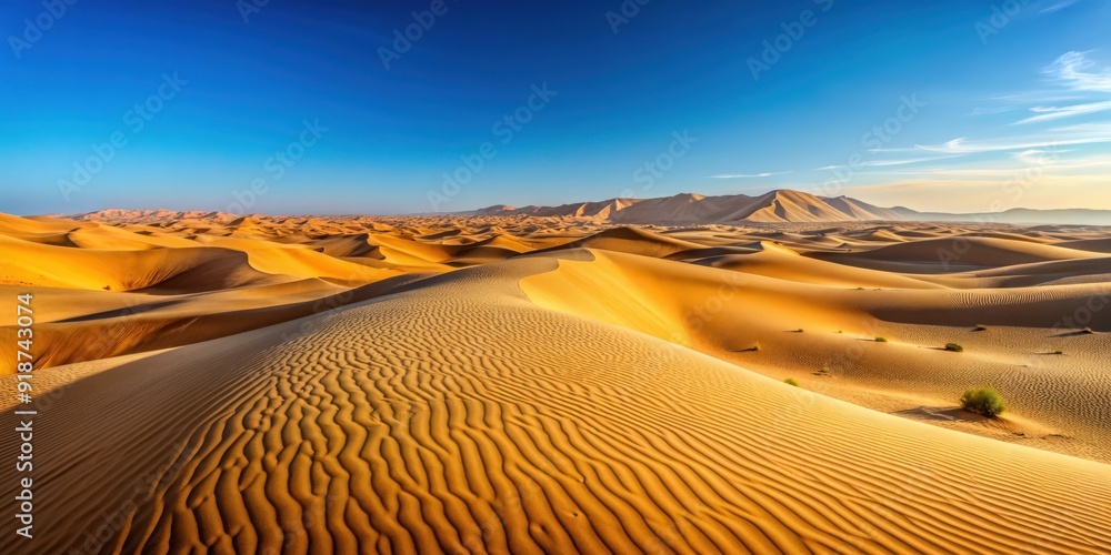 Naklejka premium Vast Arabian desert landscape with dunes and clear blue sky, Arabia, desert, sand, dunes, wilderness, arid, hot, dry