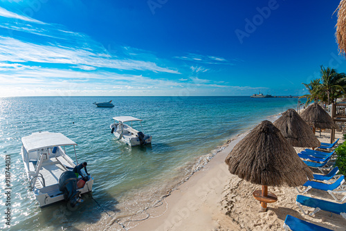 Sunny Day in Puerto Morelos: White Boats and Turquoise Caribbean Waters photo