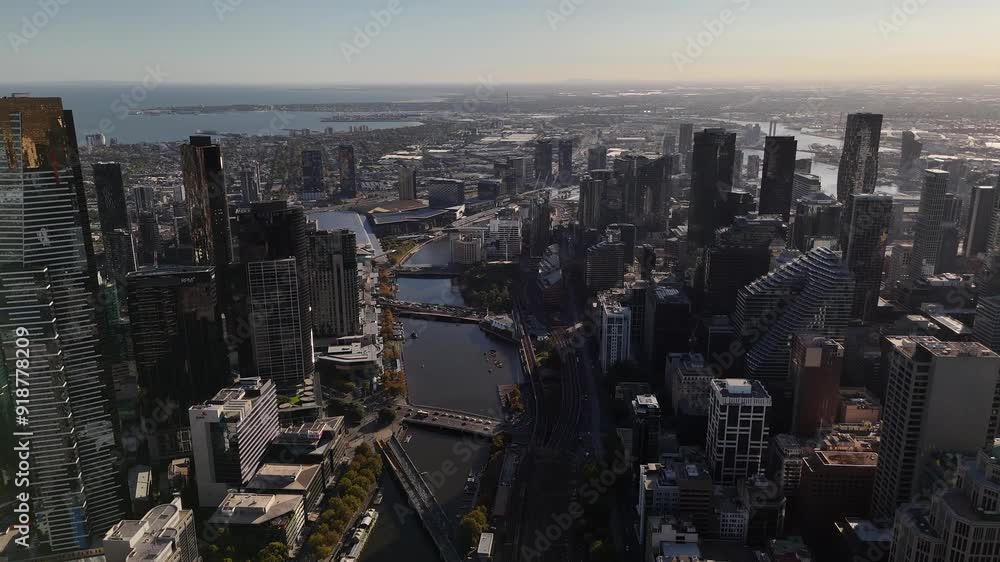Melbourne City CBD in Victoria State. Australia. Yarra River between buildings at sunset. Melbourne City CBD in Victoria State. Australia. Yarra River between buildings at sunset.