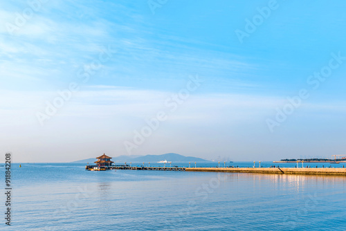 Qingdao Pier Bridge, Huilan Pavilion and Urban Skyline Scenery in Shandong, China photo