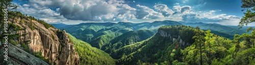 Mountain Vista with Majestic Clouds and Verdant Slopes