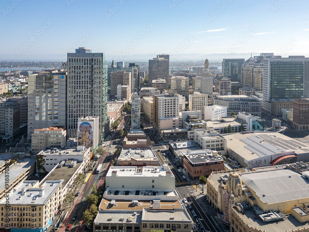 Fototapeta premium Drone photos over downtown Oakland California on a beautiful sunny day in August.