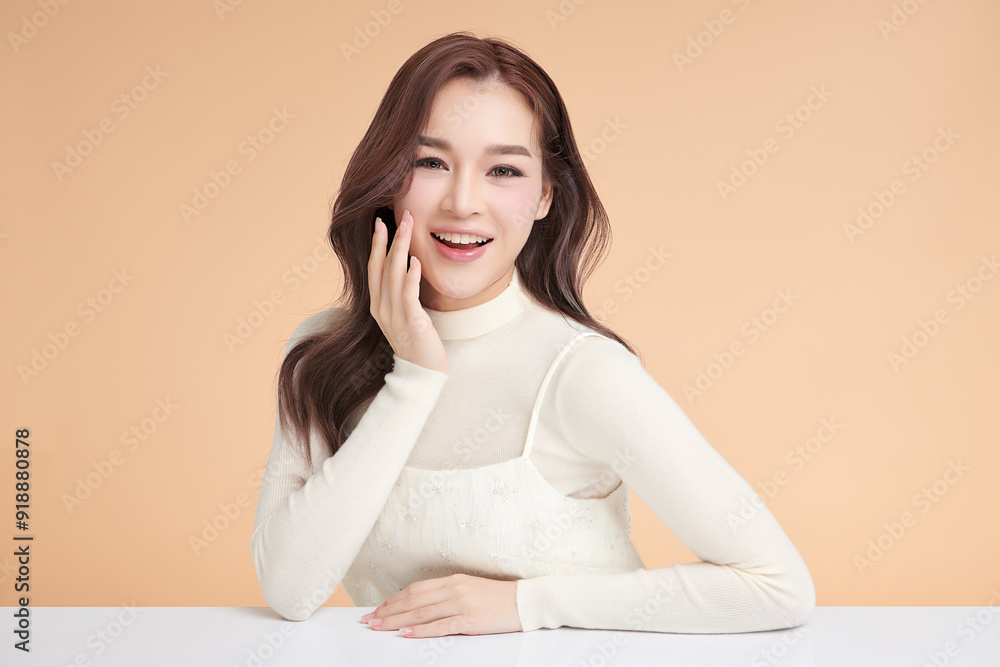 Beautiful young asian woman with clean fresh skin on beige background, Face care, Facial treatment, Cosmetology, beauty and spa, Asian women portrait. Beautiful young asian woman with clean fresh skin on beige background, Face care, Facial treatment, Cosmetology, beauty and spa, Asian women portrait.